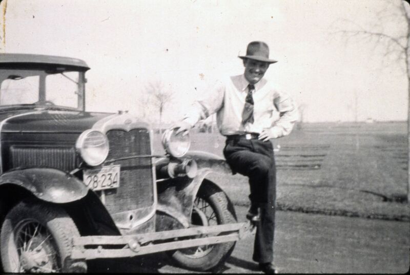 File:Man standing beside Ford automobile, 1939.jpg